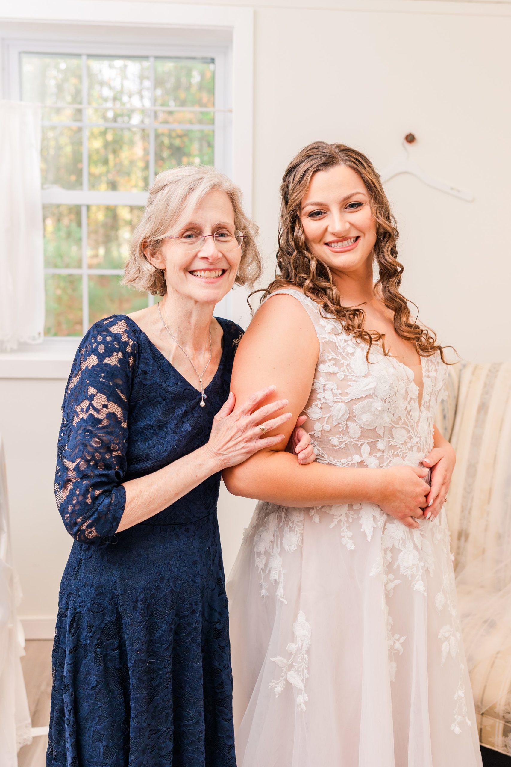 mother with daughter on wedding day