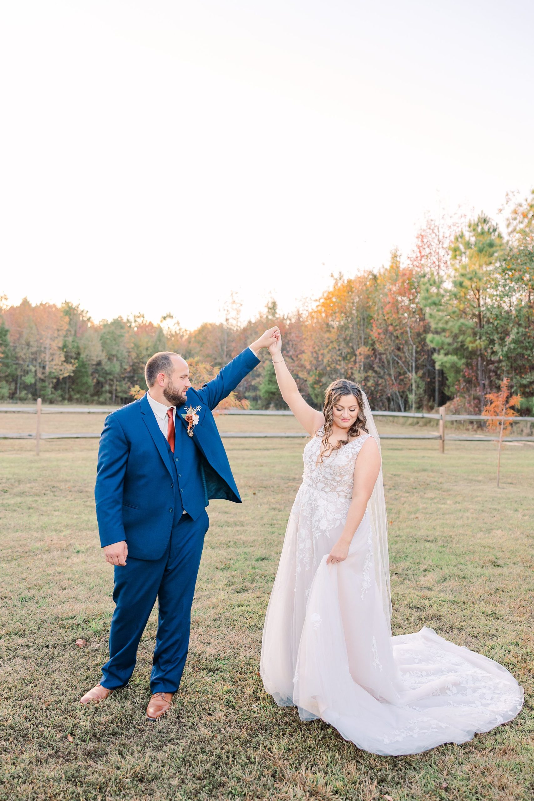bride and groom twirl