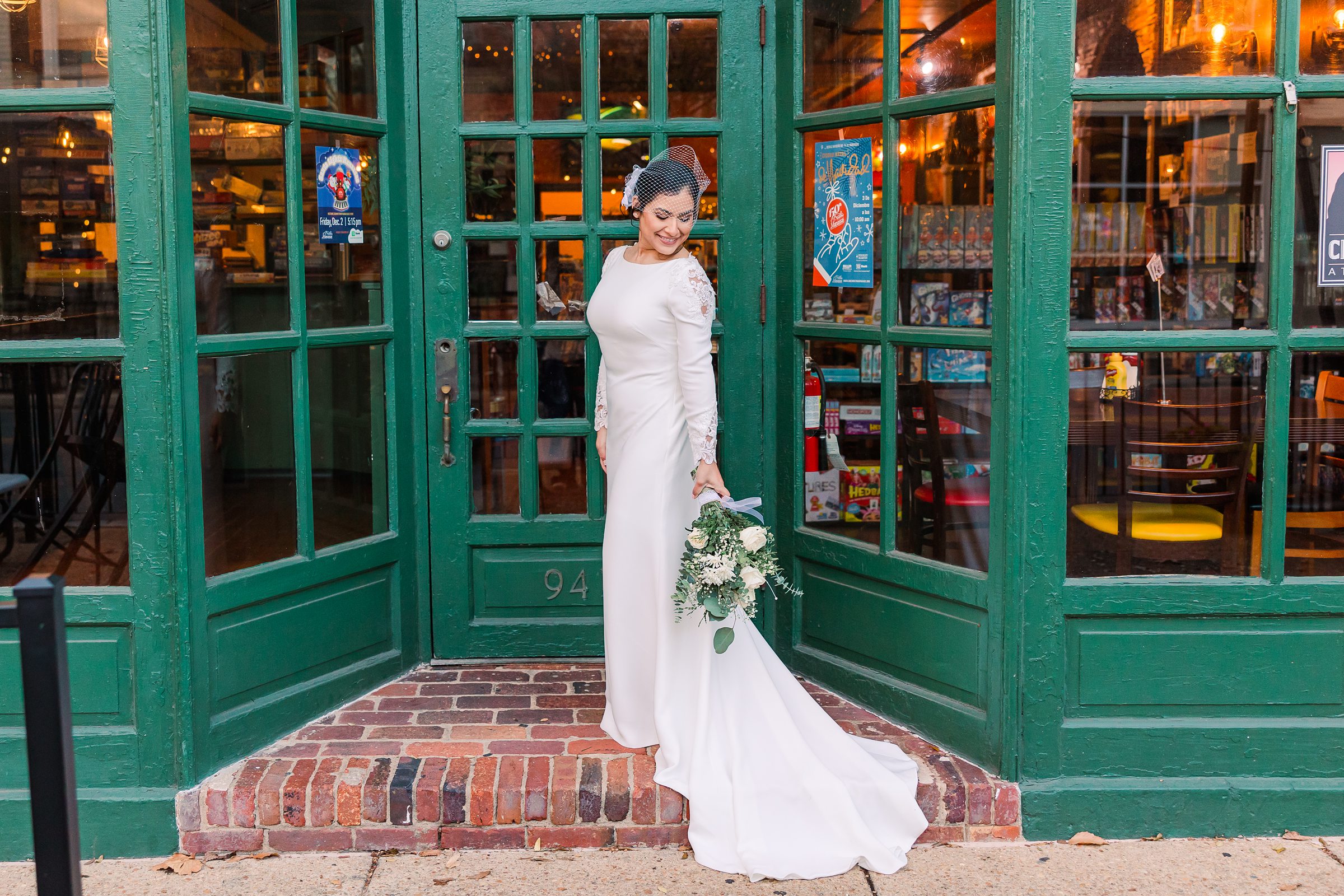 bride in front of bookshop