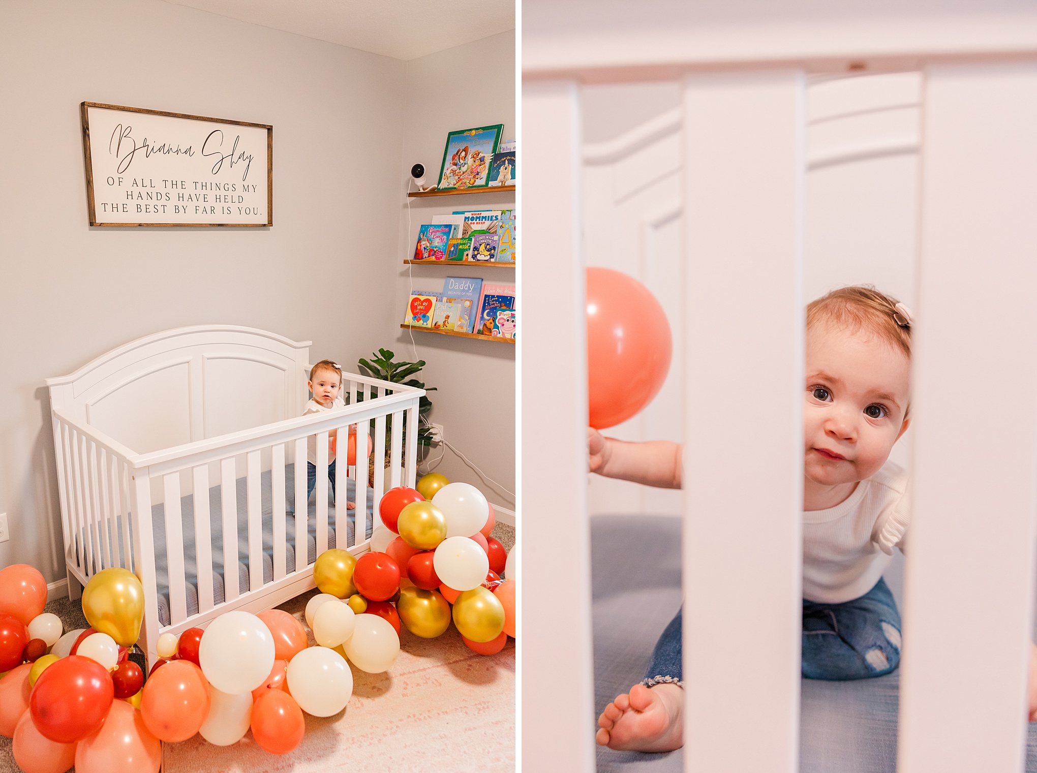 one year old girl in crib surrounded by balloons