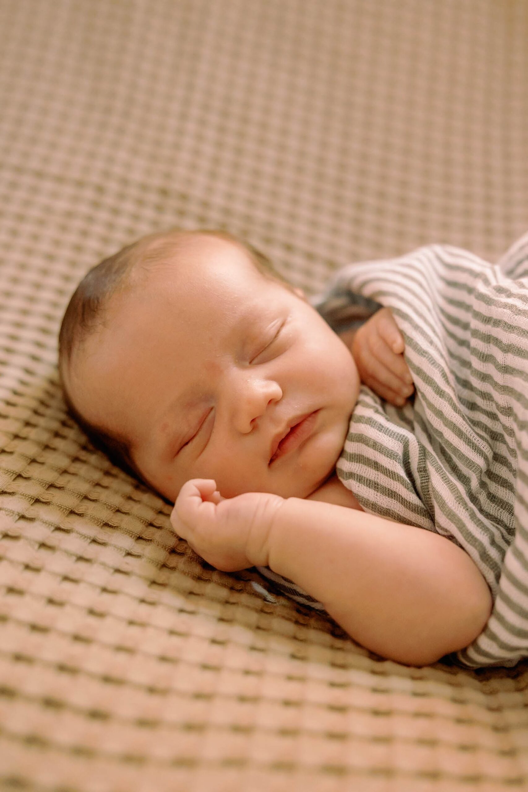 close up of a baby boy sleeping