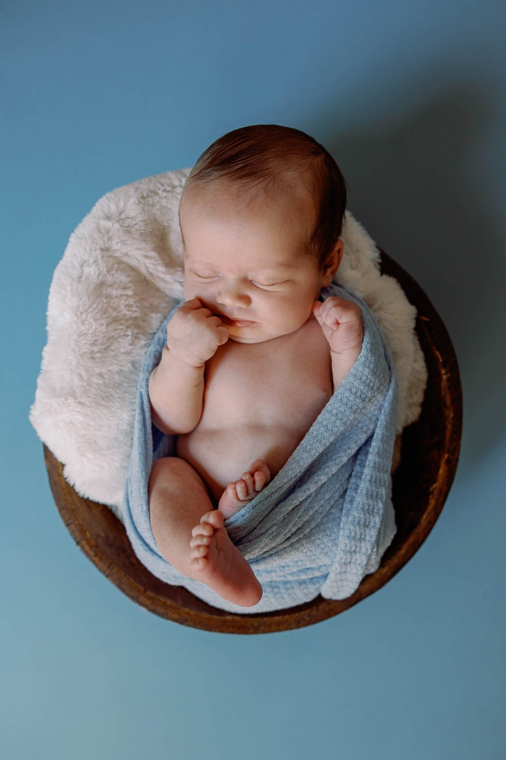 baby boy in a bowl