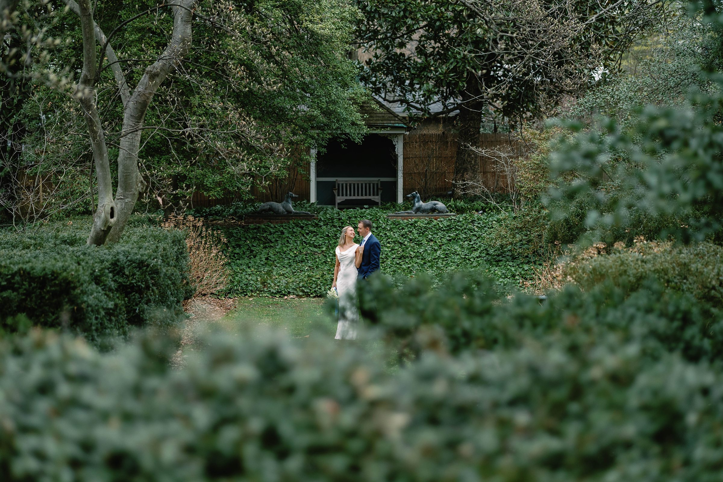 Outdoor ceremony under the magnolia trees at Tudor Place in Georgetown